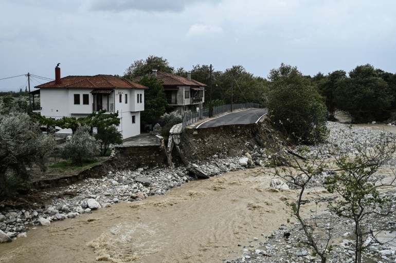 A picture taken on September 6, 2023 shows a cut road after heavy floods in Kala Nera near the city of Volos, central Greece.