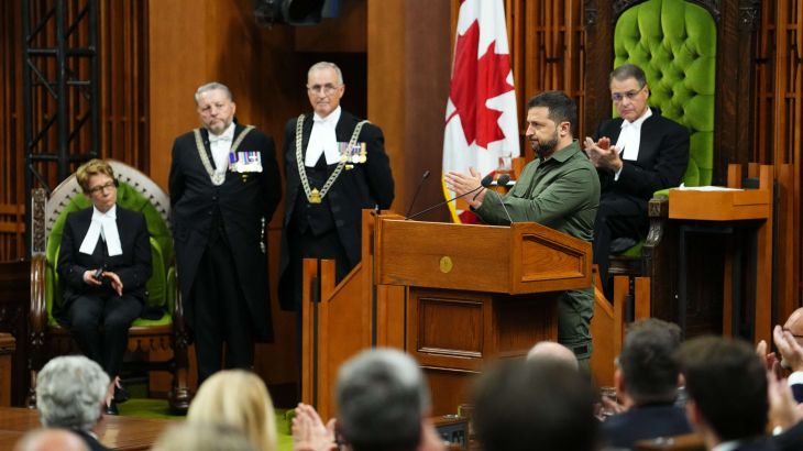Ukrainian President Volodymyr Zelensky applauds as he delivers a speech in the Canadian House of Commons in Ottawa on September 22, 2023