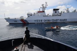 Chinese coast guard ship blocks a Philippine Bureau of Fisheries and Aquatic Resources ship