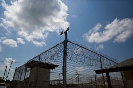 A fence stands at Elmore Correctional Facility in Elmore, Alabama, June 18, 2015. The state plans to start using nitrogen hypoxia for executions [Brynn Anderson/AP Photo/File]