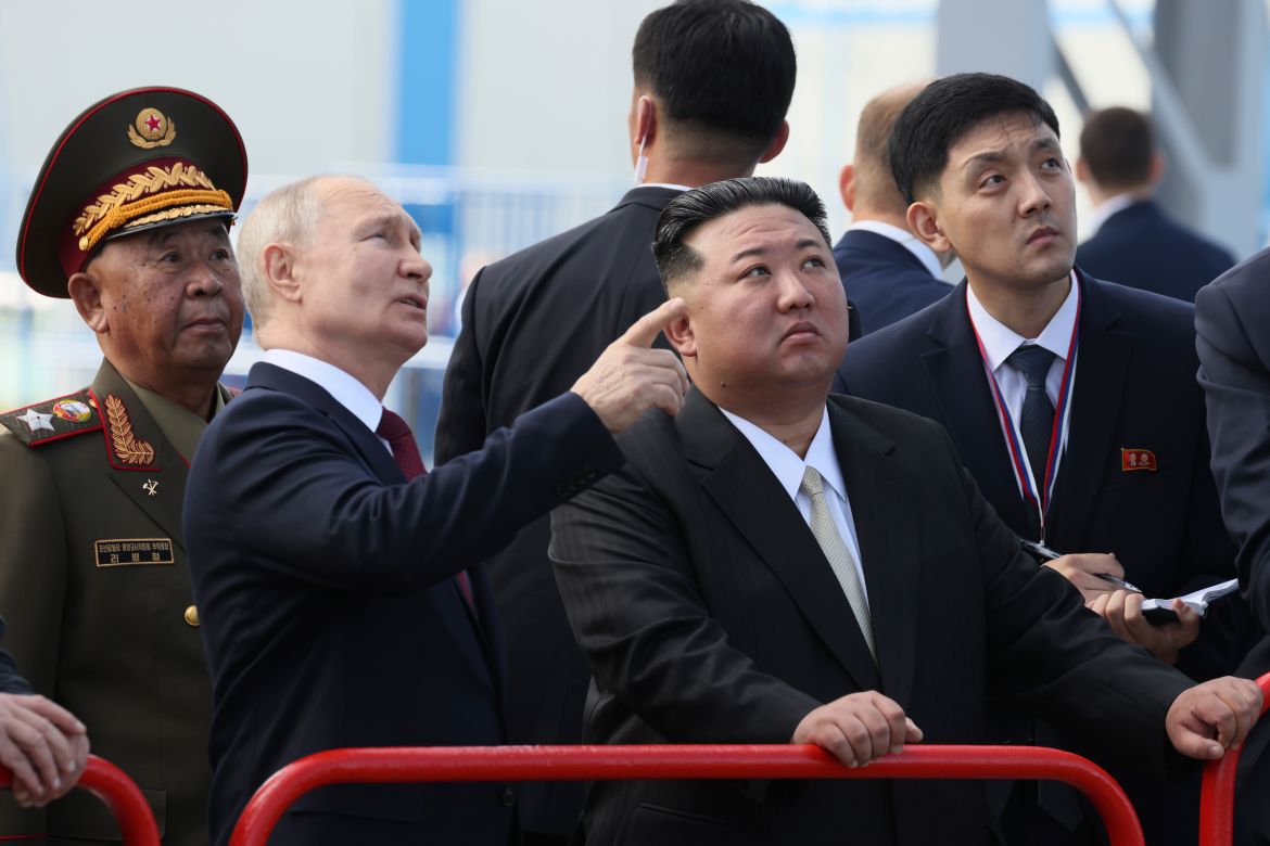 Russian President Vladimir Putin and North Korea's leader Kim Jong Un examine a launch pad during their meeting at the Vostochny cosmodrome outside the city of Tsiolkovsky,