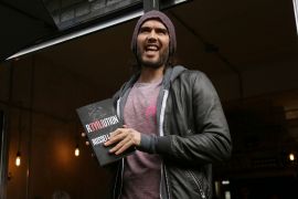 Russell Brand speaks at the opening of The Trew Era Cafe, a social enterprise community project in east London, Thursday, 26 March, 2015. [Joel Ryan/Invision/AP, file]