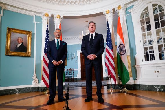 Secretary of State Antony Blinken stands with Indian External Affairs Minister Subrahmanyam Jaishankar