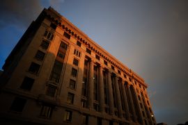 The sun sets on the Fulton County Courthouse, Monday, Aug. 14, 2023, in Atlanta.