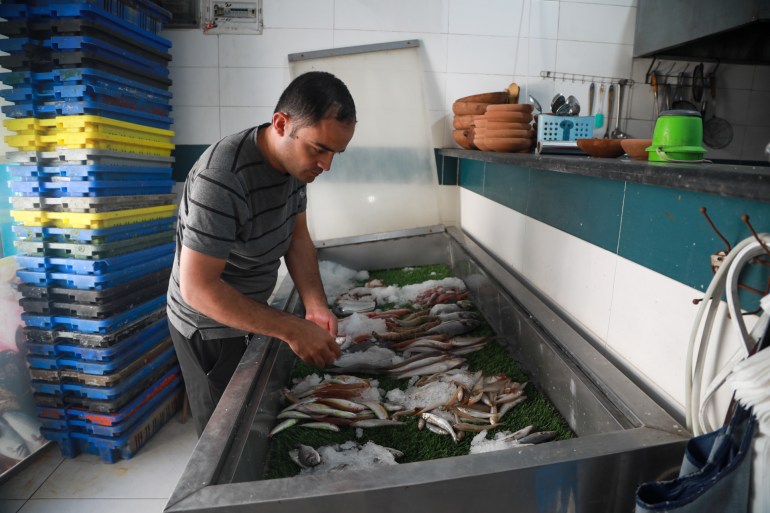 A man works in a fish exports company