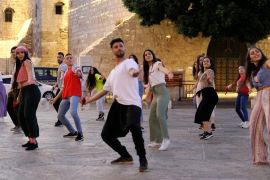 A group of dancers performing Afro-Dabke