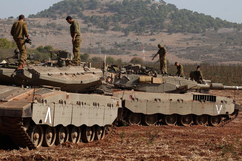 Israeli Merkava tanks in action during maneuvers at an undisclosed location along the border with Lebanon, in Israel, 24 October 2023. Tensions continue to rise at the border between Israel and Lebanon after the Israeli-Palestinian conflict escalated following an unprecedented attack carried out by Hama militants from Gaza into Israel on 07 October. EPA-EFE/ATEF SAFADI