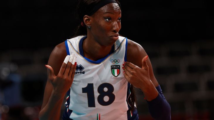 Paola Egonu of Italy gestures towards herself while wearing an Italy volleyball shirt
