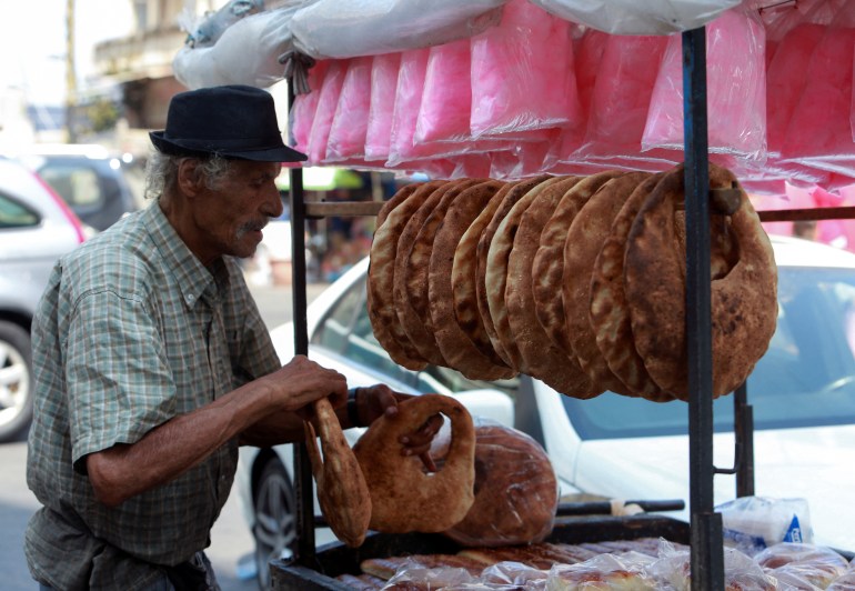 A street vendor arranges 'Kaak' a Lebanese street bread in the southern Lebanese city of Sidon, Lebanon September 6, 2022. REUTERS/Aziz Taher