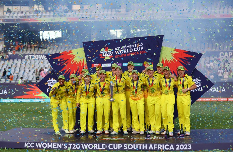 Cricket - - Final - South Africa v Australia - Newlands Cricket Ground, Cape Town, South Africa - February 26, 2023 Australia's Meg Lanning celebrates with the trophy and teammates after winning the ICC Women’s Cricket T20 World Cup REUTERS/Siphiwe Sibeko