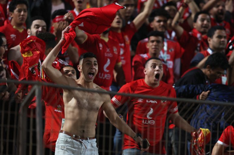 Al Ahly fans celebrate in the stands