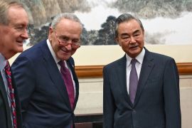 Chuck Schumer and Wang Yi in Beijing