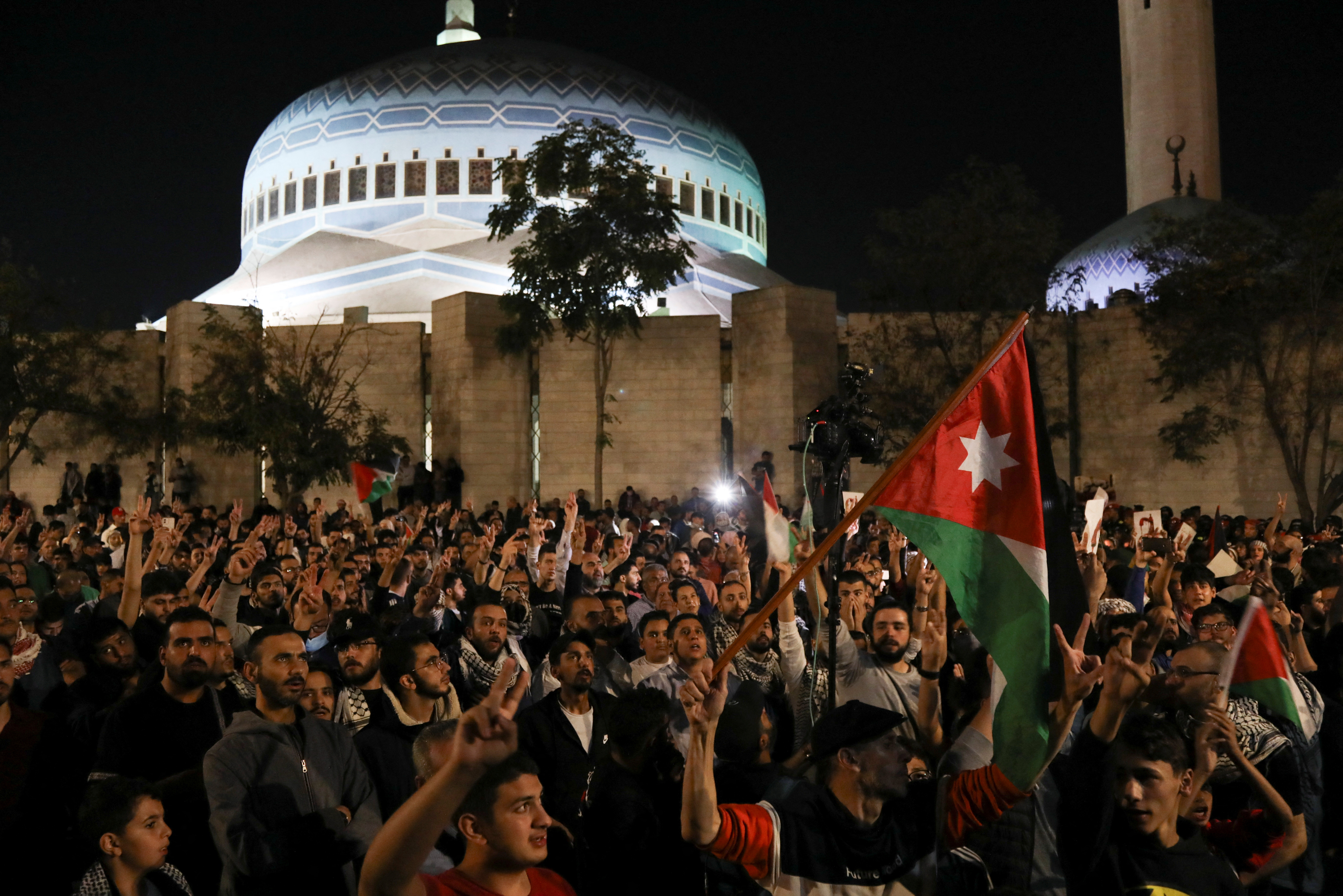 Jordanians gather outside King Abdullah Mosque to express solidarity with Palestinians in Gaza, in Amman