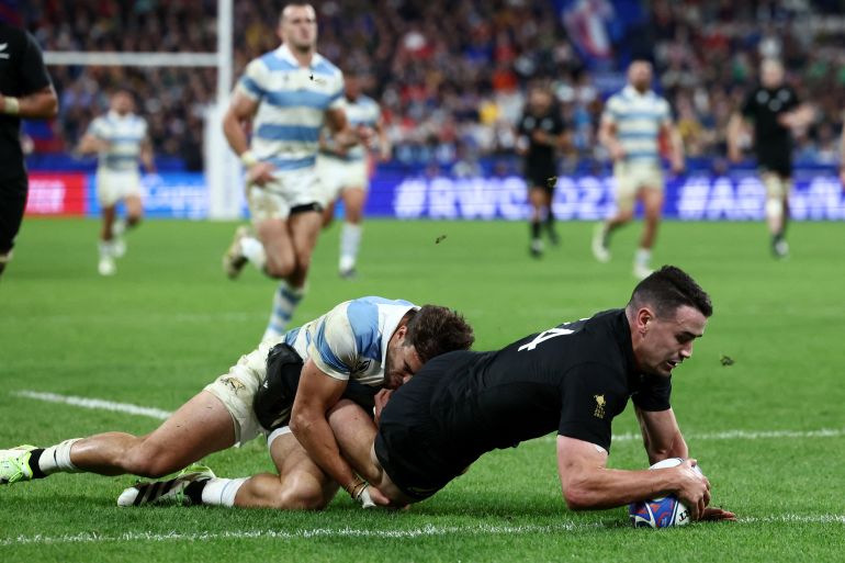 New Zealand's Will Jordan scores their seventh try and completes his hat-trick