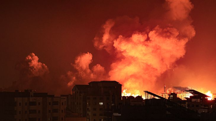 A fireball erupts during Israeli bombardment of Gaza City on October 9, 2023.