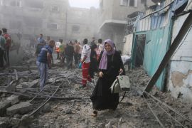 Palestinians look for survivors after an Israeli airstrike in Rafah refugee camp,