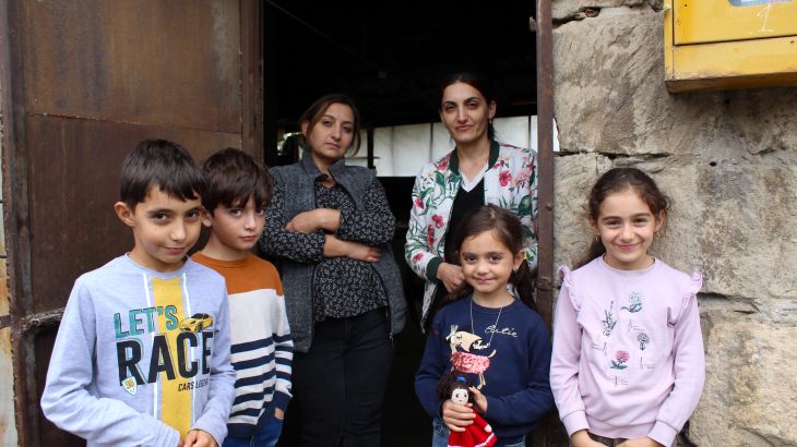 Sisters Lira Arzangulyan and Alina Khachatryan with their children outside the house they are staying in after fleeing their home in Stepanakert, Nagorno-Karabakh-1696579835
