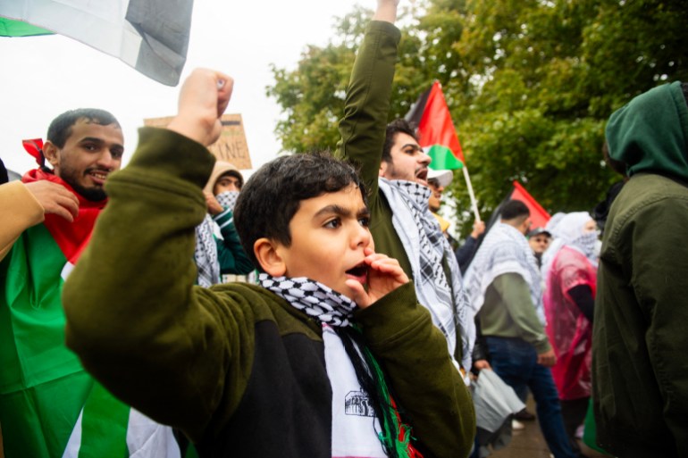 Demonstrators march in support for Palestine in Dearborn, Michigan