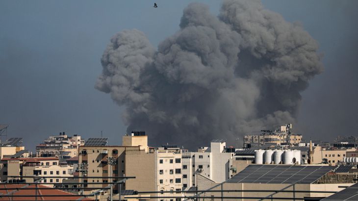 Smoke rises following an Israeli air strike in the northern Gaza