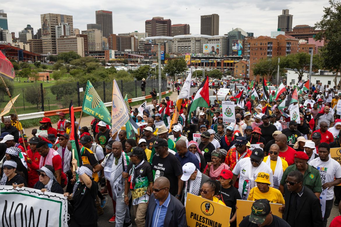 Some of the thousands of people protest as part of the International Day of Solidarity with the Palestinian People, Johannesburg, South Africa.