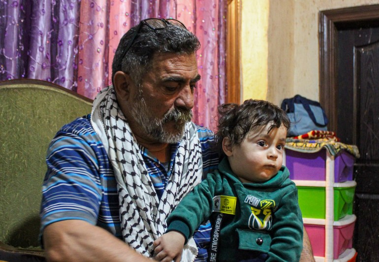 Saadi with his grandson
