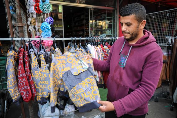 Ahmad Abulnaja has been selling clothes for seven years in Deir al-Bala, central Gaza Strip