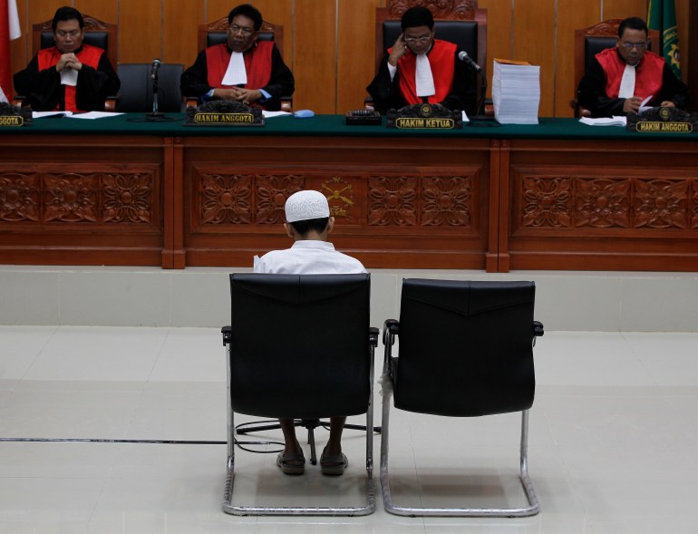 Umar Patek, a suspected bomb-maker for Jemaah Islamiah, sits in the courtroom during his trial in Jakarta February 13, 2012. Patek is on trial for multiple charges including those of the 2002 Bali bombings. REUTERS/Enny Nuraheni (INDONESIA - Tags: POLITICS CRIME LAW)