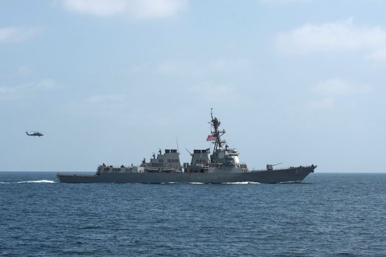 FILE PHOTO - The U.S. Navy guided-missile destroyer USS Mason conducts divisional tactic maneuvers as part of a Commander, Task Force 55, exercise in the Gulf of Oman September 10, 2016. U.S. Navy/Mass Communication Specialist 1st Class Blake Midnight/Handout via REUTERS/File PhotoTHIS IMAGE HAS BEEN SUPPLIED BY A THIRD PARTY. IT IS DISTRIBUTED, EXACTLY AS RECEIVED BY REUTERS, AS A SERVICE TO CLIENTS. FOR EDITORIAL USE ONLY. NOT FOR SALE FOR MARKETING OR ADVERTISING CAMPAIGNS. TPX IMAGES OF THE DAY