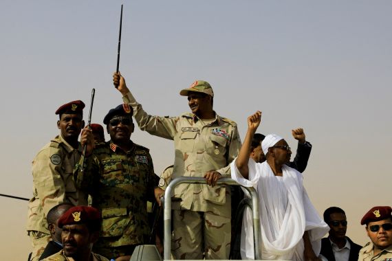 Lieutenant General Mohamed Hamdan Dagalo, deputy head of the military council and head of paramilitary Rapid Support Forces (RSF), greets his supporters as he arrives at a meeting in Aprag village, 60 kilometers away from Khartoum, Sudan, June 22, 2019