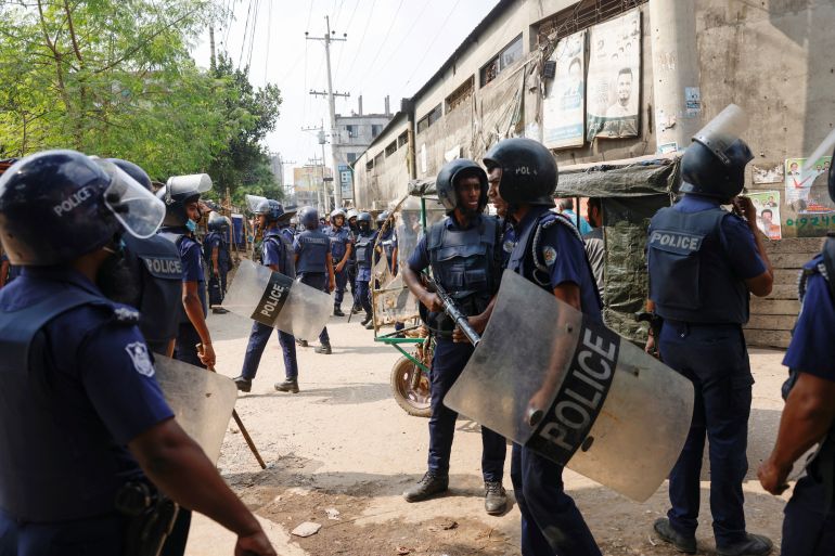 Security forces remain vigilant in front of the garment factories, following clashes between garment industry workers and police over pay, at the Ashulia area, outskirts of Dhaka, Bangladesh
