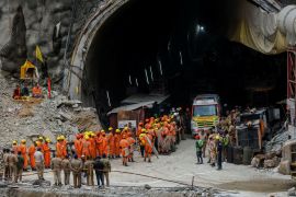 National Disaster Response Force (NDRF) personnel wait to enter a tunnel during rescue operations for trapped workers, after the tunnel collapsed, in Uttarkashi in the northern state of Uttarakhand, India, on November 28, 2023 [Francis Mascarenhas/Reuters]