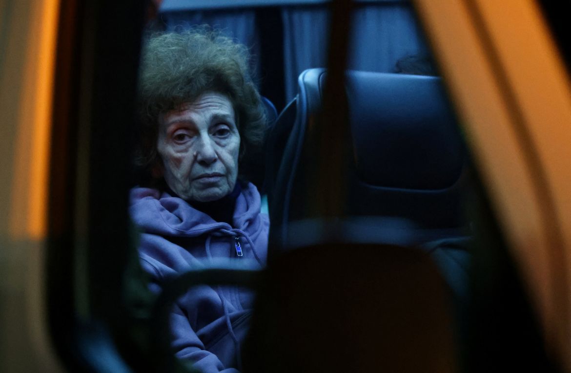 Irena Tati, 73, who was taken hostage during the October 7 attack on Israel by Palestinian militant group Hamas sits in a van after arriving in a helicopter carrying hostages released amid a hostages-prisoners swap deal between Hamas and Israel, at Sheba Medical Center in Ramat Gan, Tel Aviv district, Israel.