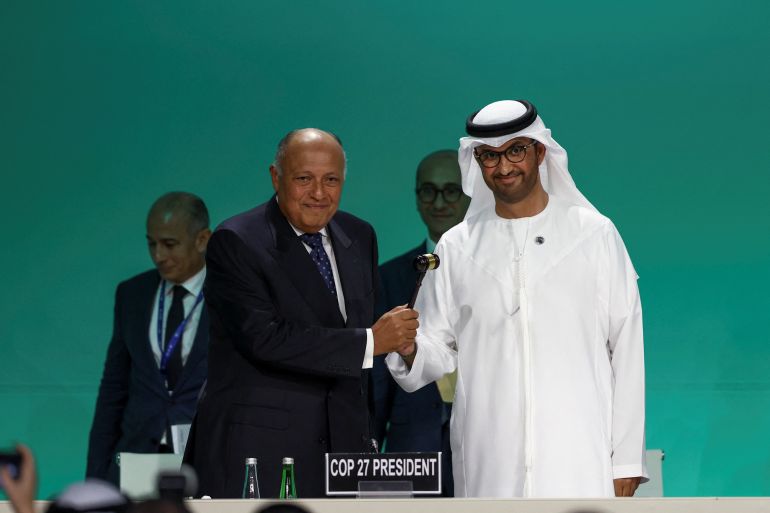 United Arab Emirates Minister of Industry and Advanced Technology and COP28 President Sultan Ahmed Al Jaber and Egyptian Foreign Minister and COP27 President Sameh Shoukry hold a gavel during the United Nations Climate Change Conference (COP28) opening in Dubai, United Arab Emirates, November 30, 2023. REUTERS/Amr Alfiky