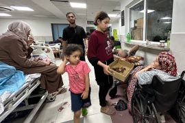 Patients and internally displaced people are pictured at Al-Shifa hospital