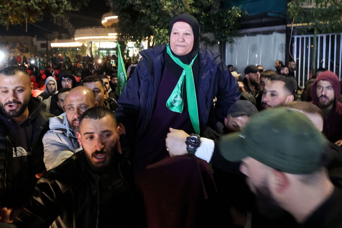Supporters carry a newly freed prisoner during a welcome ceremony following the release of Palestinian prisoners from Israeli jails in exchange for Israeli hostages held in Gaza by Hamas.