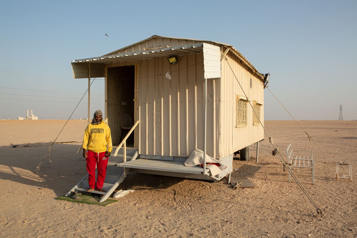 Sudanese migrant worker Hassan Ahmad works as shepherd in Kuwait's desert
