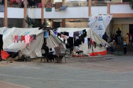 Laundry is hung up as Palestinians, displaced from their homes as a result of the Israeli attacks, try to continue their daily lives at the Aliva School in Rafah, Gaza on November 30, 2023 [Abed Rahim Khatib/Anadolu Agency]