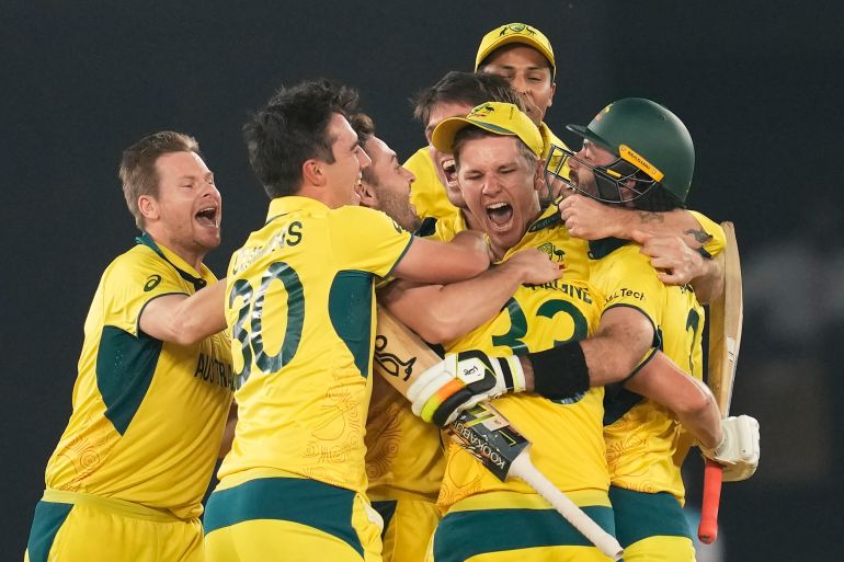 Australia players celebrate after winning the ICC Men's Cricket World Cup final match against India in Ahmedabad, India, Sunday, Nov. 19, 2023. (AP Photo/Rafiq Maqbool)
