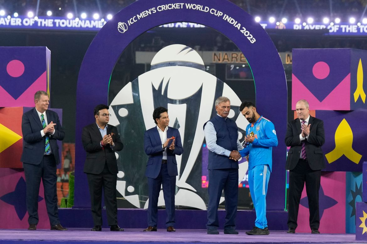 President BCCI Roger Binny presents player of the tournament award to India's Virat Kohli after the ICC Men's Cricket World Cup final match between India and Australia in Ahmedabad, India.