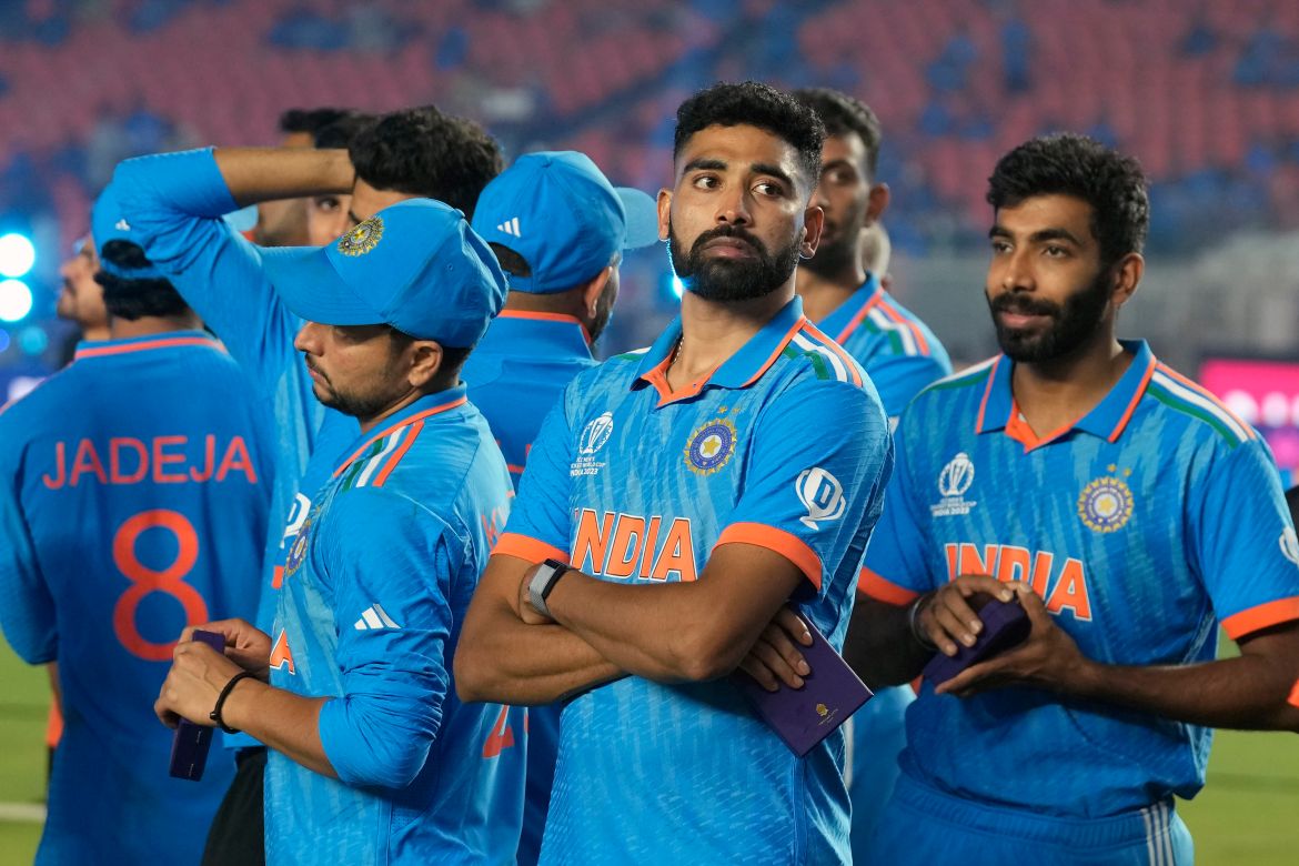 India players wait for the award ceremony after Australia won the ICC Men's Cricket World Cup final match against India in Ahmedabad, India.