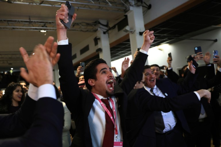 Members of the Saudi delegation cheering
