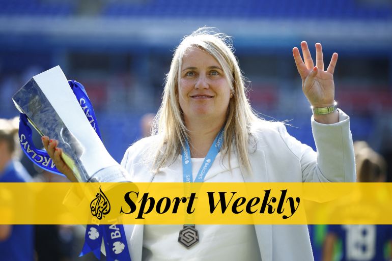 Chelsea manager Emma Hayes celebrates with the trophy after winning the Women's Super League