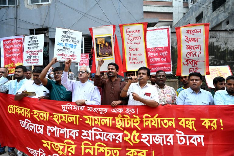 Activists of different garment workers' unions take part in a protest in front of the Minimum Wage Board office demanding rising ahead of a new minimum wage announcement in Dhaka, Bangladesh.
