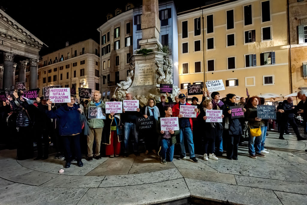 People take part in a demonstration in solidarity with Palestine, at the Pantheon, calling for the ceasefire, for the release of the hostages and against the Israeli bombing of Gaza in Rome, Italy.