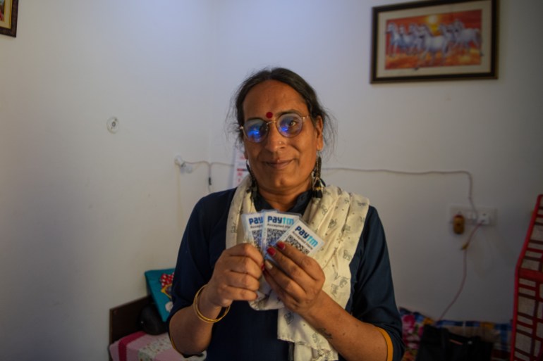 Kiran Sakhi distributes barcodes to the transgender beggars and takes a commission from their earnings