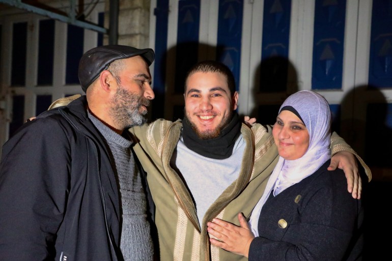 Mohamed Salhab al-Tamimi with his parents