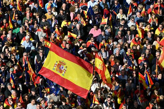Thousands demonstrate in a protest against an amnesty bill for people involved with Catalonia's failed 2017 independence bid, in Madrid on November 18, 2023. [JAVIER SORIANO / AFP]