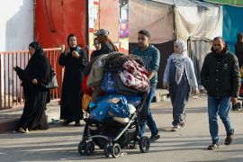 Palestinians flee their homes due to Israeli strikes in Khan Younis in the southern Gaza Strip [Ibraheem Abu Mustafa/Reuters]