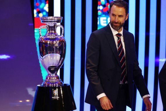 England manager Gareth Southgate with the trophy after the draw