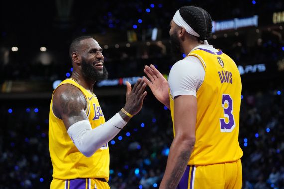 Dec 9, 2023; Las Vegas, Nevada, USA; Los Angeles Lakers forward LeBron James (23) and forward Anthony Davis (3) celebrate after winning the in season tournament championship final against the Indiana Pacers at T-Mobile Arena. Mandatory Credit: Kyle Terada-USA TODAY Sports